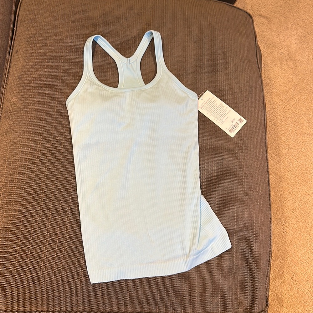 Brand new ice blue Ebb to Street lululemon tank!! Color not sold anymore